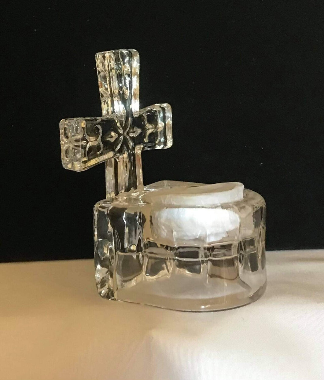 Glass votive candle holder with one tea light